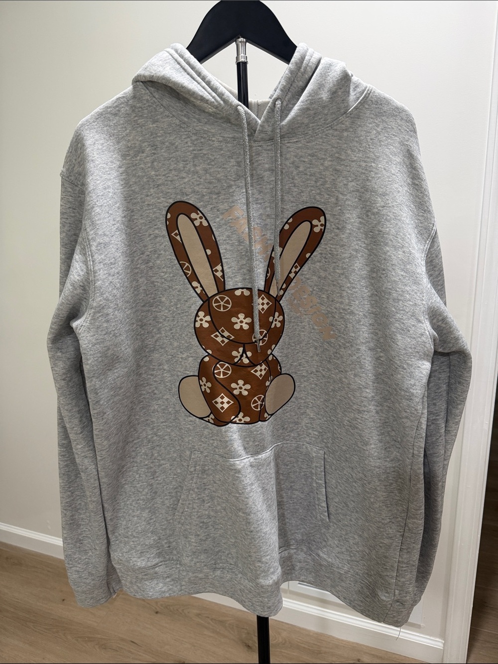Unisex Gray Crewneck Hoodie with Brown Patterned Bunny Graphic